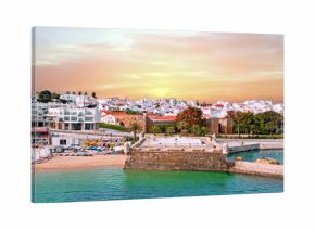 Aerial from the city Lagos with the Forte da Bandeira in Portugal at sunset