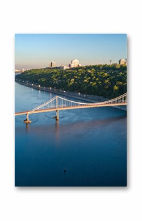 Aerial top view of pedestrian Park bridge and Dnieper river from above, city of Kiev, Ukraine  