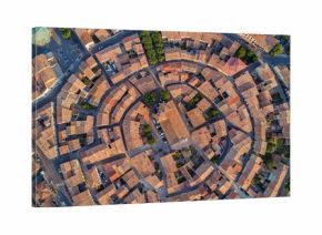 Aerial top view of Bram medieval village architecture and roofs from above, Southern France  