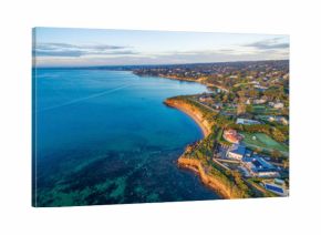 Beautiful rugged coastal cliffs and luxury homes near the ocean - Mornington Peninsula coastline aerial view