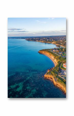 Beautiful rugged coastal cliffs and luxury homes near the ocean - Mornington Peninsula coastline aerial view