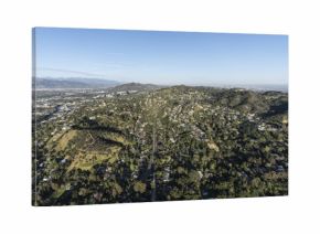 Aerial view of hillside homes along Laurel Canyon Blvd in the Studio City and Hollywood Hills area of the San Fernando Valley in Los Angeles California.  