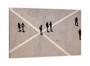 Aerial view of a group of people walking in a square in the city of lisbon in Portugal