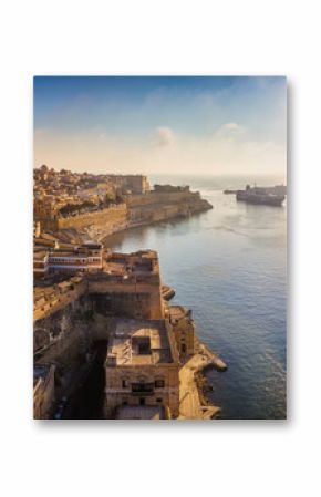 Valletta, Malta - Panoramic aerial skyline view of Valletta when cruise ships sailing in the Grand harbor at surnise