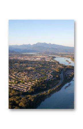 Aerial view of residential neighborhood in Port Coquitlam during a sunny summer sunset. Taken in Vancouver, BC, Canada.