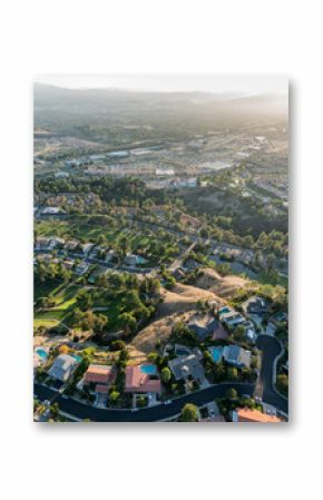 Aerial view of streets, homes and parks in the Porter Ranch area of Los Angeles, California.
