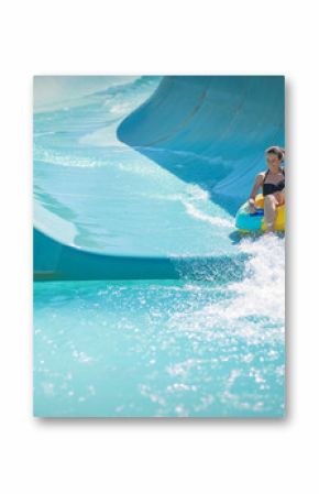 beautiful girl pulls off the slides at the water park