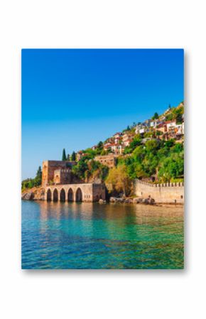 Landscape of ancient shipyard near of Kizil Kule tower in Alanya peninsula, Antalya district, Turkey, Asia. Famous tourist destination with high mountains. Part of ancient old Castle.