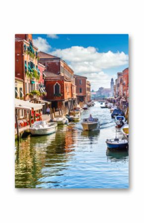 Island murano in Venice Italy. View on canal with boat