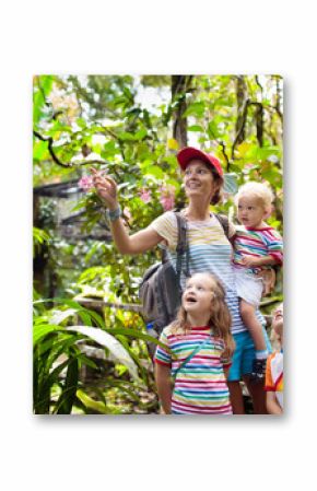 Family hiking in jungle.