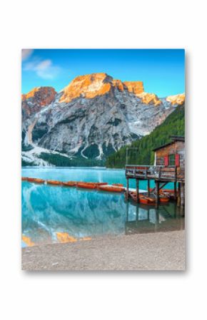 Spectacular wooden boathouse on the alpine lake, Dolomites, Italy, Europe