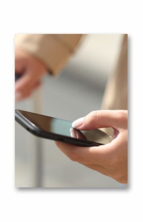 Traveler woman hand consulting a smartphone