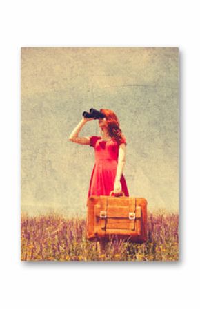 girl in red dress with suitcase and binocular