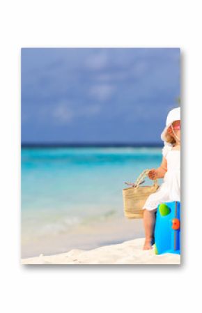 cute little girl travel on summer beach