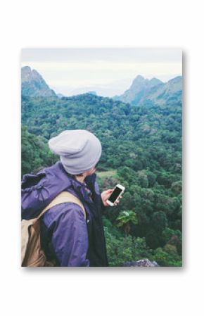  young man traveler He is using mobile phone travel concept