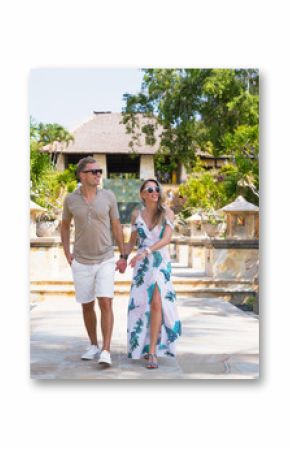 Romantic couple walking in tropical resort