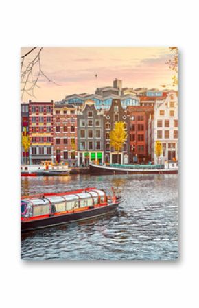 Channel in Amsterdam Netherlands houses river Amstel landmark