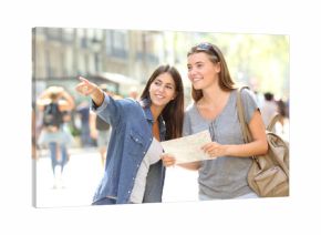 Girl helping to a tourist who asks direction