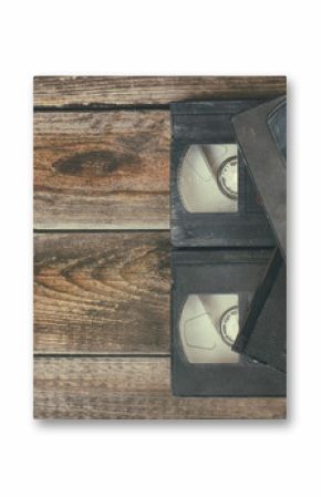 stack of VHS video tape cassette over wooden background. top view photo  