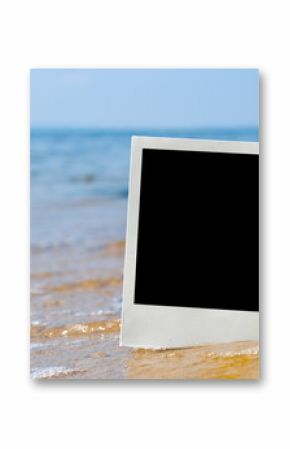 Photo card on sand beach.