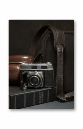 Still life of Vintage camera and bag