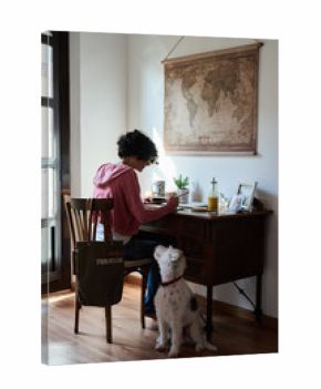 Woman writing at table