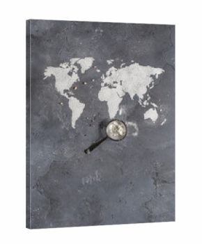 A strainer is near contours of the map of the world from flour on stone surface