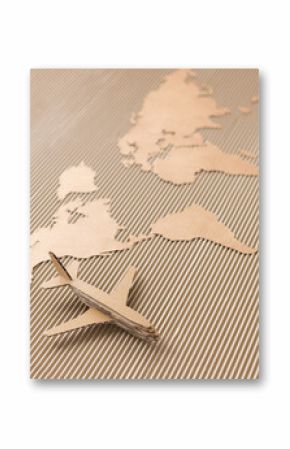 Airplane and world map made of cardboard