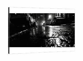 A black and white photo of a city street at night. Perfect for capturing the urban atmosphere and nightlife.