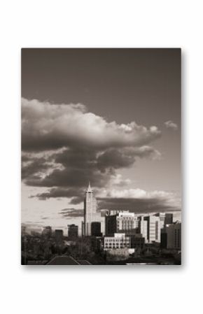 A dramatic city skyline of downtown Raleigh, North Carolina in the United States in black and white.