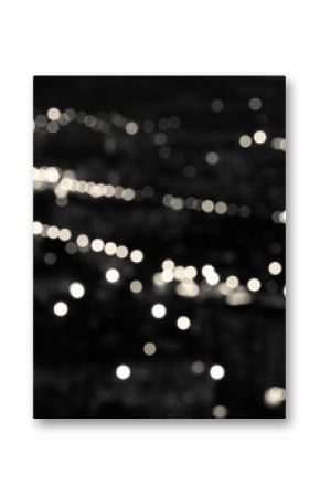 abstract white black circular bokeh background, city lights in t