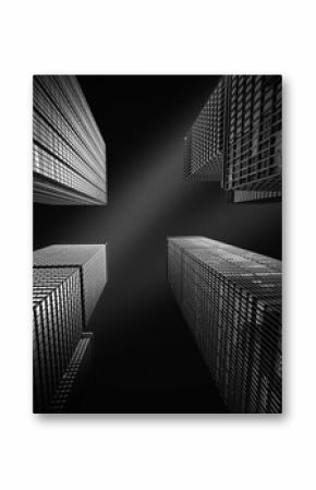 Architectural fine-art black and white photograph with four New York skyscrapers converging towards the sky