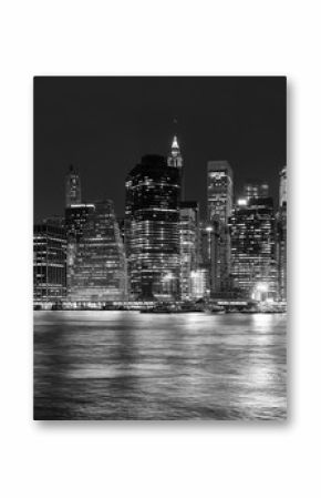 Black and white panoramic picture of Manhattan at night, New York City, USA.