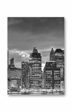 Black and white panoramic picture of Manhattan skyline at night, New York City, USA.