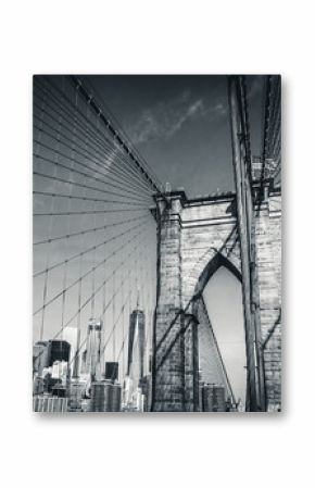 The Brooklyn Bridge in black and white with the new World Trade Center in the background, New York City, USA