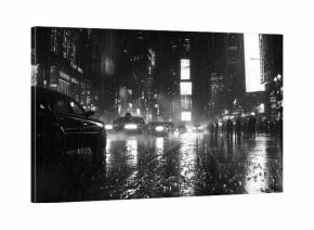 A cinematic black and white rain-soaked city street 
