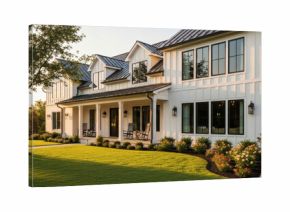 A modern farmhouse exterior at golden hour: white siding, black window frames, a large welcoming porch with rocking chairs, and a manicured front lawn