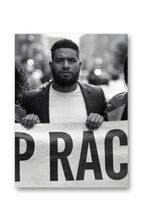black and white photography Urban Protestors Holding Anti-Racism Banner