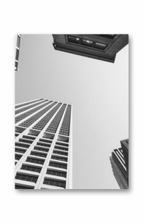 Looking up at New York buildings, black and white picture, USA.