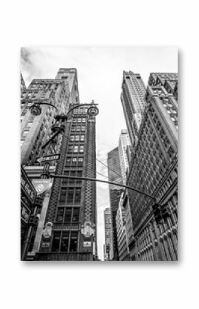 Manhattan street view with big buildings, New York, USA. Black and white