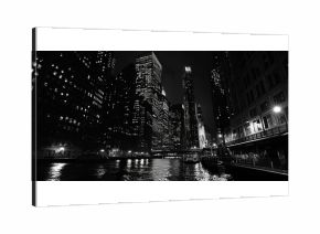 A black and white photo capturing the beauty of a city at night. Perfect for urban-themed projects and designs