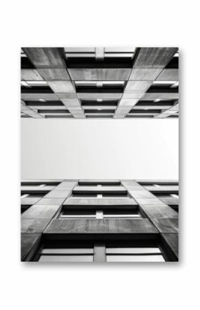 A black and white photograph capturing the symmetry of architectural lines.