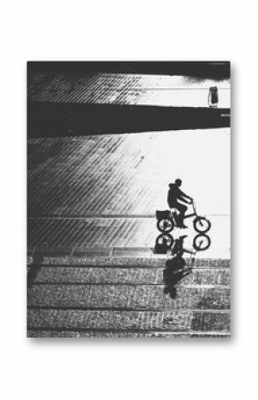 aerial view of biker silhouette - street scene - contrast black and white Nantes, FRANCE - NOVEMBER 2018