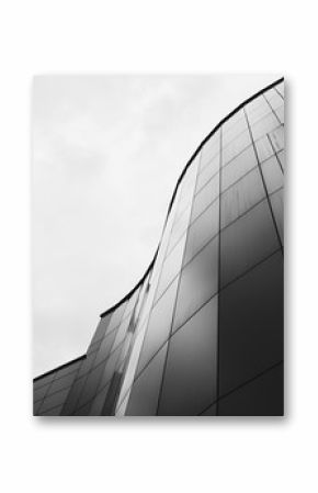 modern office building with a curved facade. black and white image