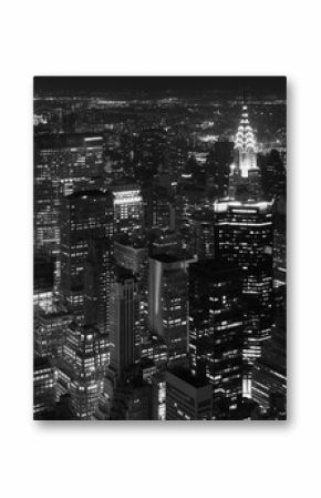 Black and white aerial photo of Manhattan at night, New York City, US.