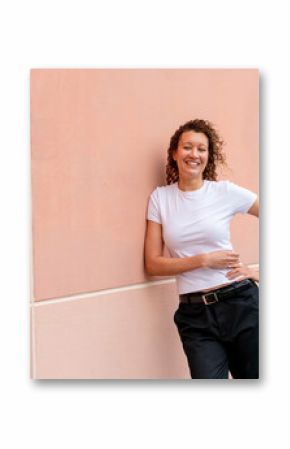 happy portrait against pink wall