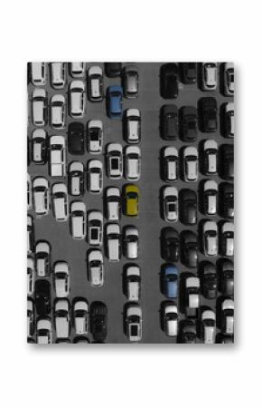 Aerial view of cars tightly packed in geometric rows, a contrasting palette of stark whites, deep blacks, and vibrant blues and yellows, Fremantle, Western Australia, Australia.