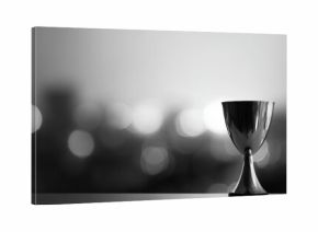 Black and white trophy with blurred city background, symbolizing success and achievement, monochrome sports award concept