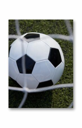 USA, New York State, New York City, Close-up of soccer ball on turf field