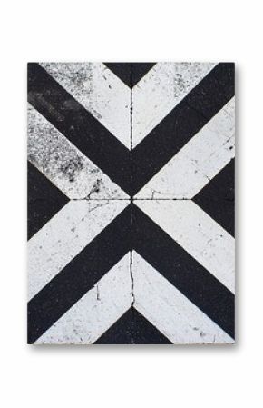 Black and white geometric pattern with bold chevron shapes on pavement